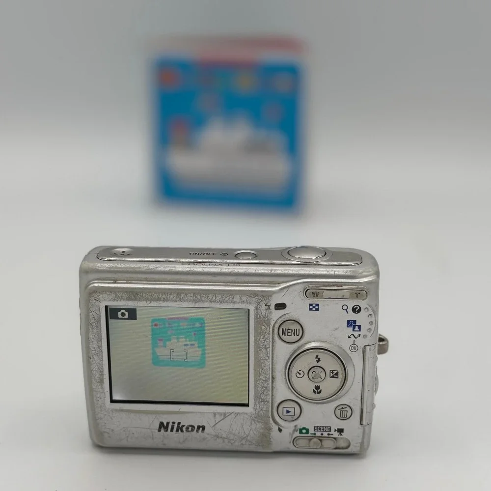Nikon Coolpix L10 Silver Digital Camera 5.0MP 3x Optical Zoom Bundle Working